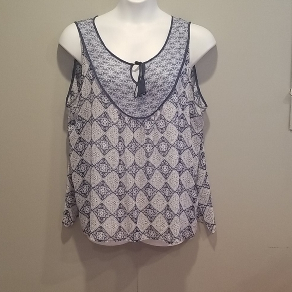 Rose & Olivia blue design sheer sleeveless blouse. - Picture 1 of 7